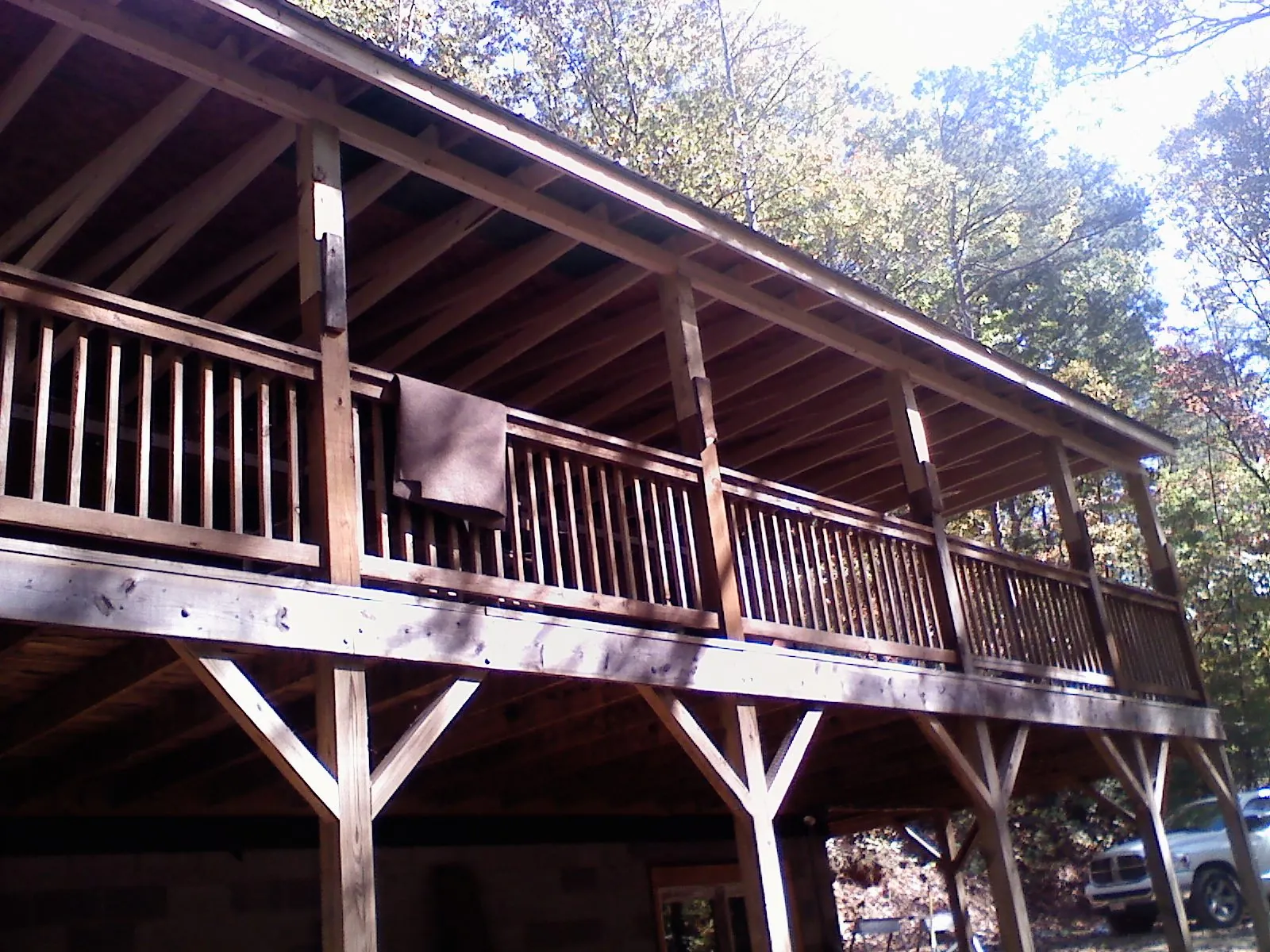Timber framing under a new elevated porch and deck — Roof Leak Repair in Pierrepont Manor by Roofing Brothers
